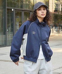 UMBRO（アンブロ）の「UMBRO/アンブロ 別注 ワンポイントロゴ刺繍 パイピング ラグランスリーブ ダブルジップ トラックジャケット（ジャージ）」