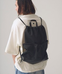 ADAMPATEK/leather trimmed  mesh drawstring bag/レザーxメッシュ巾着ナップサック