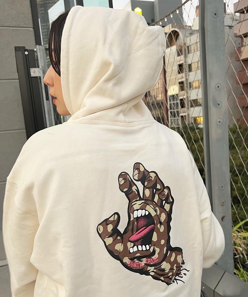 ムラサキスポーツ by 光永（ムラサキスポーツバイヒナタ）の「【ZOZOタウン限定アイテム】SANTACRUZ/サンタクルーズ × 光永（ひなた）監修アイテム  ビッグシルエット  ダルメシアン柄ロゴパーカー   502213344（パーカー・レディース・ホワイト/ブラック/グレー/オレンジ・M/L/XL）」の2枚目の写真
