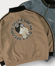 TIMELY WARNING（タイムリーワーニング）の「【Selfie Freak】8ボールガールハーフジップスウェット/バックプリント/ビッグシルエット（スウェット・メンズ）」