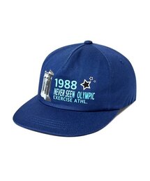 EXERCISE（エクササイズ）の「1988 NEVER SEEN OLYMPIC CAP_BLUE（キャップ）」