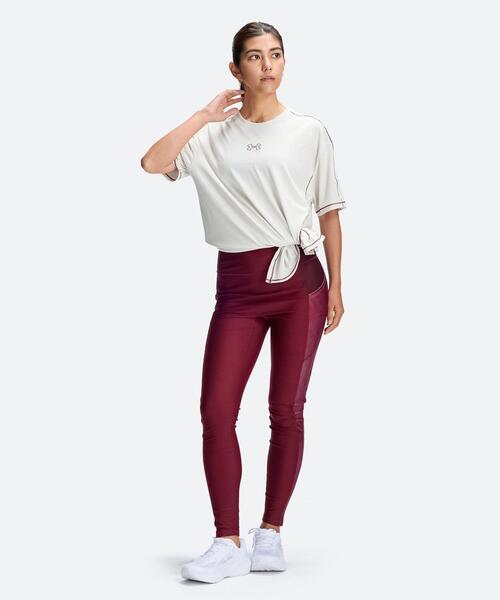 UNDER ARMOUR(アンダーアーマー)の「UAテック オーバーサイズド タイド アップ ショートスリーブ Tシャツ(トレーニング/レディース)(Tシャツ/カットソー・レディース・オフホワイト・L/XL/M/S)」の4枚目の写真