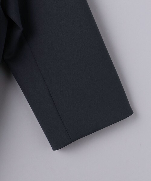 UNITED ARROWS（ユナイテッドアローズ）の「SPONGY Aライン ミドルコート（ノーカラーコート・レディース・ネイビー/オフホワイト・36/34/38）」の15枚目の写真