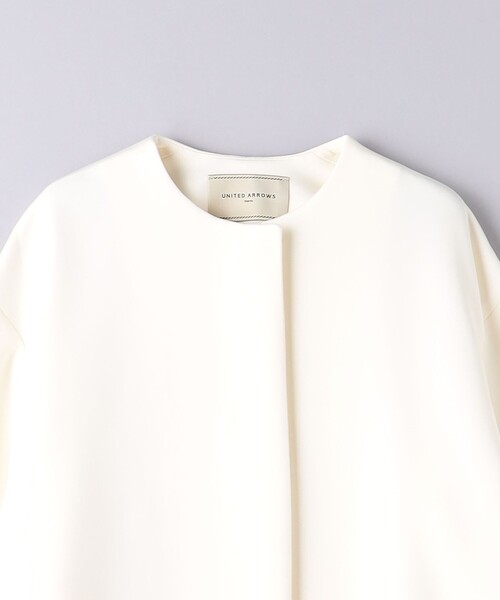 UNITED ARROWS（ユナイテッドアローズ）の「SPONGY Aライン ミドルコート（ノーカラーコート・レディース・ネイビー/オフホワイト・36/34/38）」の19枚目の写真