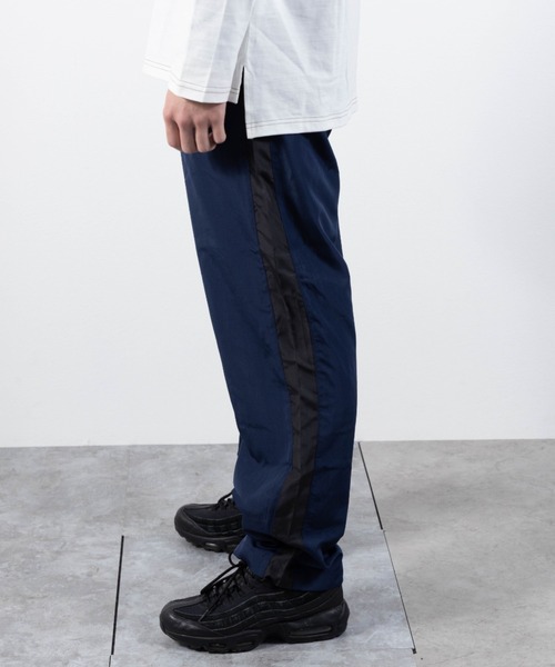 NYLAUS(ナイラス)の「レギュラーシルエット 裏メッシュ サイドライン/サイドパイピング イージーパンツ(その他パンツ・メンズ・ブラック系1/ブラック系2/カーキ系1/カーキ系2/ネイビー系1/ネイビー系2/レッド系1/レッド系2・LL/M/L)」の6枚目の写真