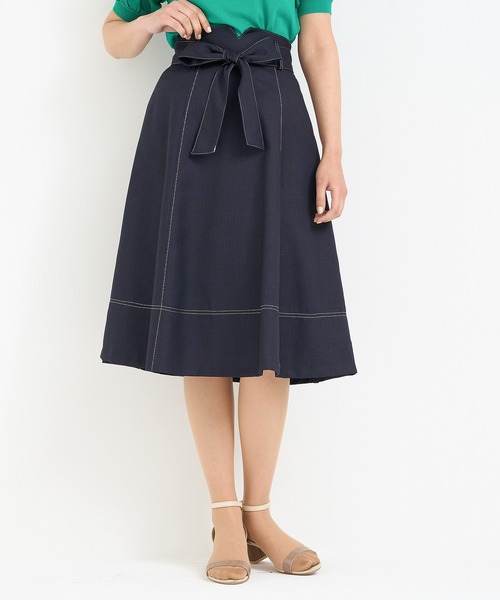 TRUDEA(トルディア)の「共ベルトステッチハギフレアスカート(スカート・レディース・ネイビー/ブルー・SMALL/MEDIUM)」の1枚目の写真