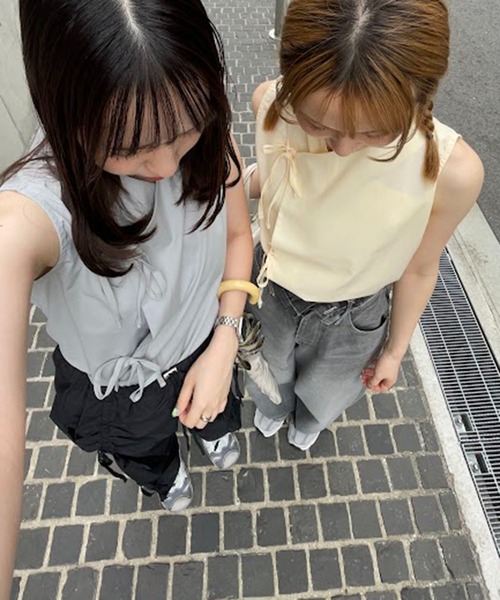 nomnom(ノムノム)の「【nomnom】アシメリボンチャイナブラウス(シャツ/ブラウス・レディース・オフホワイト/ライトイエロー/グレー・FREE)」の1枚目の写真