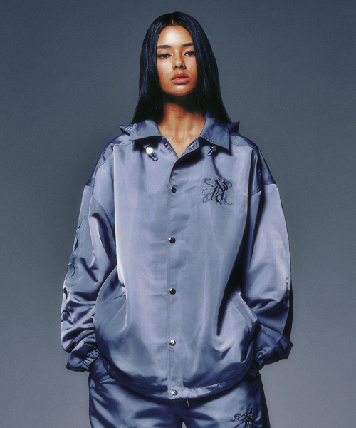 セール】P.O.M EMBLEM HOOD JACKET LIGHT BLUE（ナイロンジャケット
