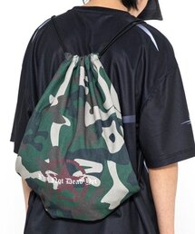 XTONZ（エクストーンズ）の「XTA028 ミヌのカモストリングバッグ (CAMO)（バックパック/リュック）」