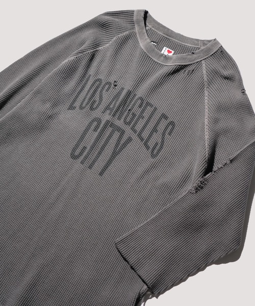 C.E.L.STORE(セルストア)の「I LOVE LA / アイラブエルエー 3/4 SLEEVE PRINTED WAFFLE TEE ダメージ加工 7分丈 ワッフル サーマルカットソー(Tシャツ/カットソー・メンズ・ブラック系その他/ブラック/ナチュラル・MEDIUM/LARGE)」の1枚目の写真