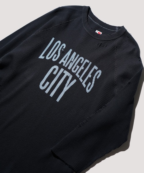 C.E.L.STORE(セルストア)の「I LOVE LA / アイラブエルエー 3/4 SLEEVE PRINTED WAFFLE TEE ダメージ加工 7分丈 ワッフル サーマルカットソー(Tシャツ/カットソー・メンズ・ブラック系その他/ブラック/ナチュラル・MEDIUM/LARGE)」の2枚目の写真