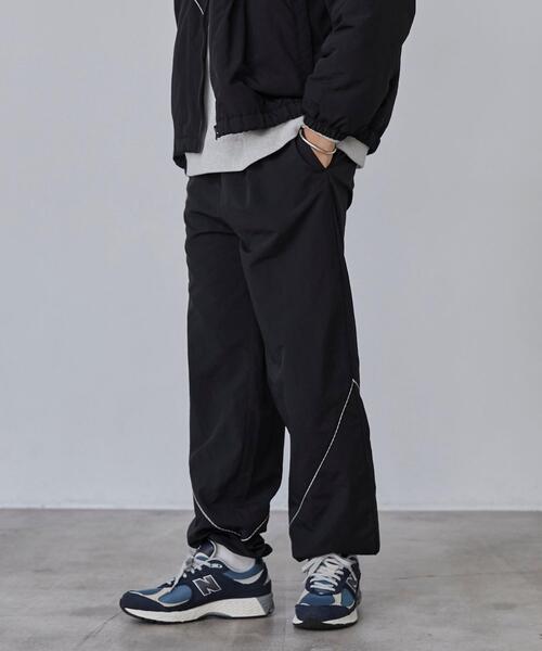 coen(コーエン)の「California Sportswear(カリフォルニアスポーツウェア)別注ナイロントラックパンツ(セットアップ対応)(その他パンツ・メンズ・オリーブ/ブラック・M/XL/L)」の5枚目の写真