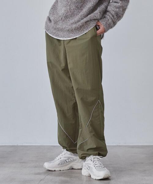 coen(コーエン)の「California Sportswear(カリフォルニアスポーツウェア)別注ナイロントラックパンツ(セットアップ対応)(その他パンツ・メンズ・オリーブ/ブラック・M/XL/L)」の6枚目の写真