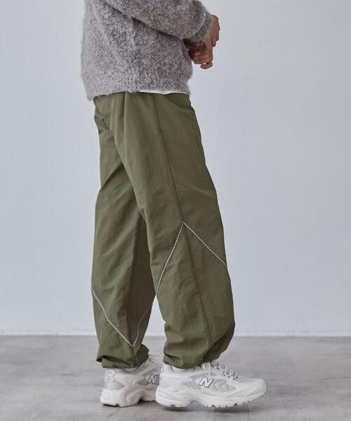 coen(コーエン)の「California Sportswear(カリフォルニアスポーツウェア)別注ナイロントラックパンツ(セットアップ対応)(その他パンツ・メンズ・オリーブ/ブラック・M/XL/L)」の8枚目の写真