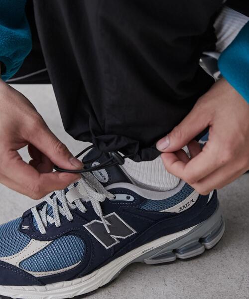 coen(コーエン)の「California Sportswear(カリフォルニアスポーツウェア)別注ナイロントラックパンツ(セットアップ対応)(その他パンツ・メンズ・オリーブ/ブラック・M/XL/L)」の9枚目の写真