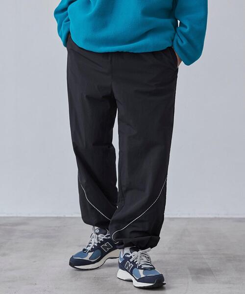 coen(コーエン)の「California Sportswear(カリフォルニアスポーツウェア)別注ナイロントラックパンツ(セットアップ対応)(その他パンツ・メンズ・オリーブ/ブラック・M/XL/L)」の10枚目の写真