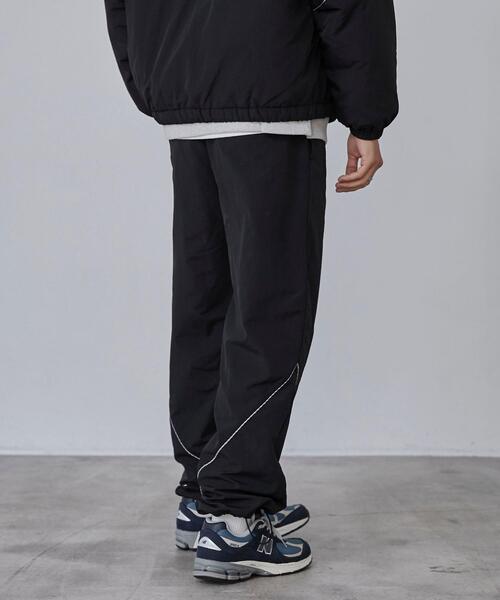 coen(コーエン)の「California Sportswear(カリフォルニアスポーツウェア)別注ナイロントラックパンツ(セットアップ対応)(その他パンツ・メンズ・オリーブ/ブラック・M/XL/L)」の13枚目の写真