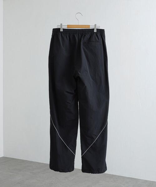 coen(コーエン)の「California Sportswear(カリフォルニアスポーツウェア)別注ナイロントラックパンツ(セットアップ対応)(その他パンツ・メンズ・オリーブ/ブラック・M/XL/L)」の22枚目の写真