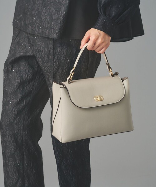 UNITED ARROWS（ユナイテッドアローズ）の「ダブルフェイス ワンハンドル バッグ（ハンドバッグ・レディース・ブラック/ベージュ・FREE）」の2枚目の写真