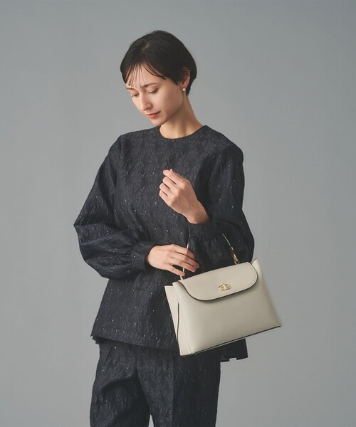 UNITED ARROWS（ユナイテッドアローズ）の「ダブルフェイス ワンハンドル バッグ（ハンドバッグ・レディース・ブラック/ベージュ・FREE）」の4枚目の写真