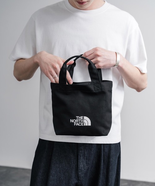 THE NORTH FACE（ザノースフェイス）の「THE NORTH FACE LOGO COTTON BAG S ミニトートロゴハンドバッグ（ハンドバッグ・メンズ・クリーム/ブラック/ダークオレンジ/ターコイズブルー・FREE）」の5枚目の写真