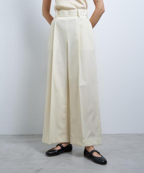 LANVIN en Bleu(ランバンオンブルー)の「ウールポリエステルタックワイドパンツ(その他パンツ・レディース・ネイビー/オフホワイト・38/36)」の1枚目の写真