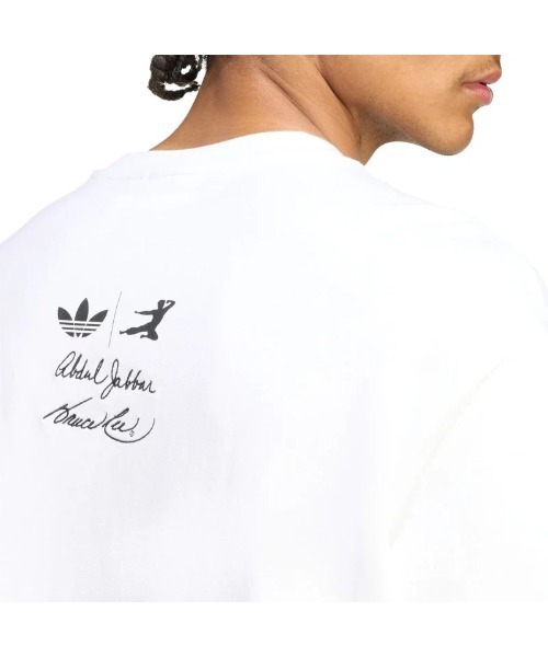 adidas(アディダス)の「adidas Originals Hot Shot Graphic Tee(アディダスオリジナルス ホットショット グラフィック Tシャツ)(Tシャツ/カットソー・メンズ・ホワイト・SMALL/MEDIUM/XX-LARGE/X-LARGE/LARGE)」の5枚目の写真