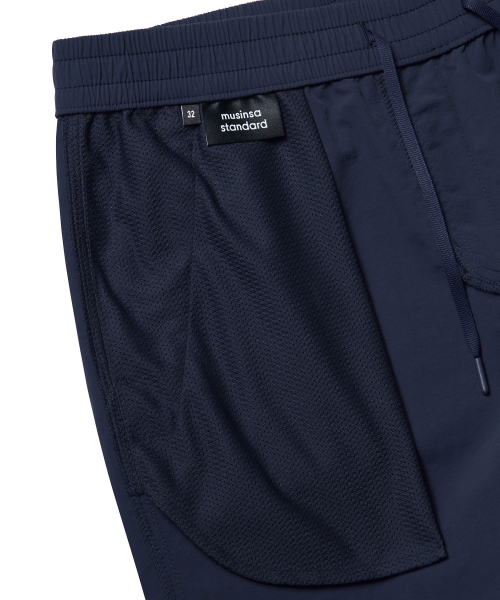 MUSINSA STANDARD（ムシンサスタンダード）の「ナイロンバンディングショーツ_5.5インチ [ネイビー]（その他パンツ・メンズ・その他・38/36/34/32/30/26/28）」の5枚目の写真