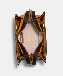 COACH（コーチ）の「ローグ 25 ウィズ クリーチャー パッチ