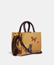 COACH（コーチ）の「ローグ 25 ウィズ クリーチャー パッチ 