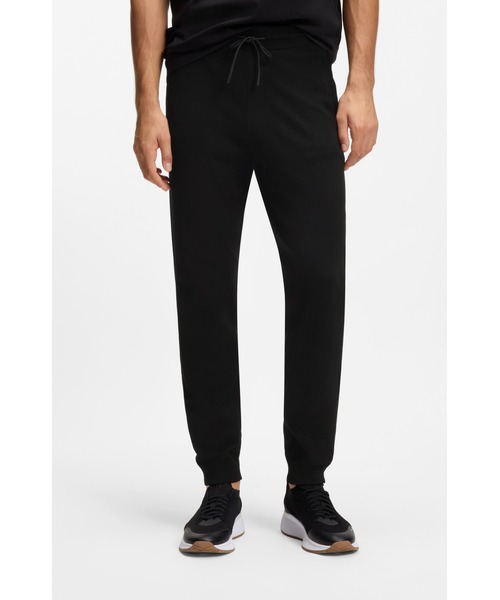 BOSS(ボス)の「ニット トラックスーツボトムス レギュラーフィット(その他パンツ・メンズ・ダークブルー・L/M/S/XL)」の1枚目の写真