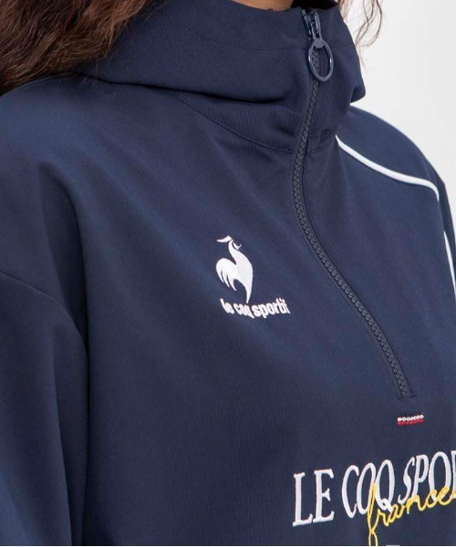 le coq sportif（ルコックスポルティフ）の「ルコック イヤートップクロスジャケット フード付き 撥水 脇ポケット  ジャージ スウェット スポーツウエア レディース トレーニングウエア（その他アウター・レディース・ホワイト/ネイビー・M/L/XL/S）」の6枚目の写真