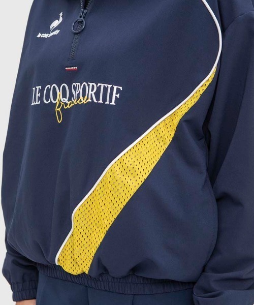 le coq sportif（ルコックスポルティフ）の「ルコック イヤートップクロスジャケット フード付き 撥水 脇ポケット  ジャージ スウェット スポーツウエア レディース トレーニングウエア（その他アウター・レディース・ホワイト/ネイビー・M/L/XL/S）」の8枚目の写真