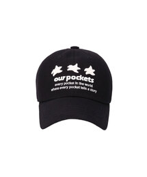 OURPOCKETS（アワーポケッツ）の「アワーポケットシグネチャースローガンボールキャップ（ブラック）（キャップ）」