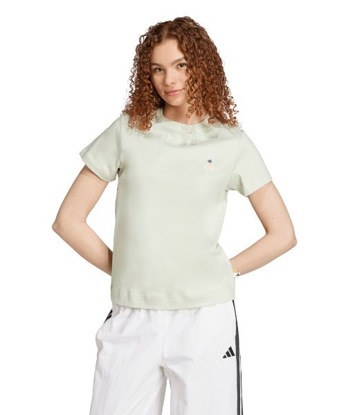 adidas(アディダス)の「アディダス adidas キャット パッチ グラフィック 半袖Tシャツ(Tシャツ/カットソー・レディース・ライトグリーン/ピンク/オフホワイト・M/L/XL)」の1枚目の写真