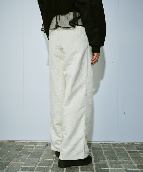 AIC.（エーアイシー）の「ジオメトリックキルトタックパンツ（その他