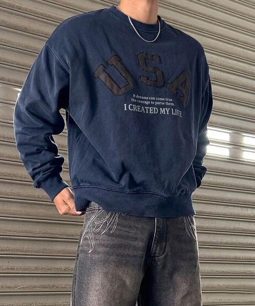 NYLAUS(ナイラス)の「【NYS】USAワッペン ピグメントトレーナー / スウェット カモフラ刺繍 ユニセックス(スウェット・メンズ・ピンク/ネイビー/チャコール・L/M)」の1枚目の写真