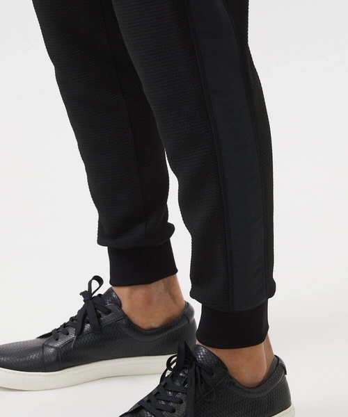 MICHEL KLEIN HOMME (ミッシェルクランオム)の「ダブルフェイスジョガーパンツ セットアップ(その他パンツ・メンズ・ブラック/オフホワイト・MEDIUM/LARGE/X-LARGE)」の16枚目の写真