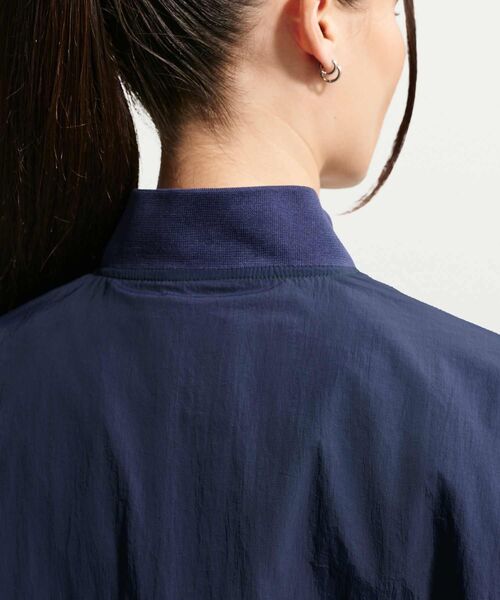 NIKE(ナイキ)の「ナイキ スポーツウェア ウィメンズ オーバーサイズド バーシティ ジャケット / Nike Sportswear Women's Oversized Varsity Jacket IF0333-323 Fir(ブルゾン・レディース・カモフラージュ・XL/L/XS/S/M)」の16枚目の写真