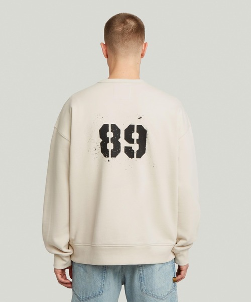G-STAR（ジースター）の「Sprayed 89 Loose Sweater/ステンシルグラフィックロゴルーズスウェット/トレーナー（スウェット・メンズ・ブルー系その他/グレー系その他/ホワイト系その他/ダークブラック・X-SMALL/SMALL/MEDIUM/LARGE/X-LARGE）」の10枚目の写真