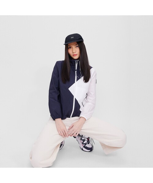 AIGLE(エーグル)の「ナジョティ ジャケット(ブルゾン・レディース・オレンジ/ネイビー・40/38/36)」の3枚目の写真