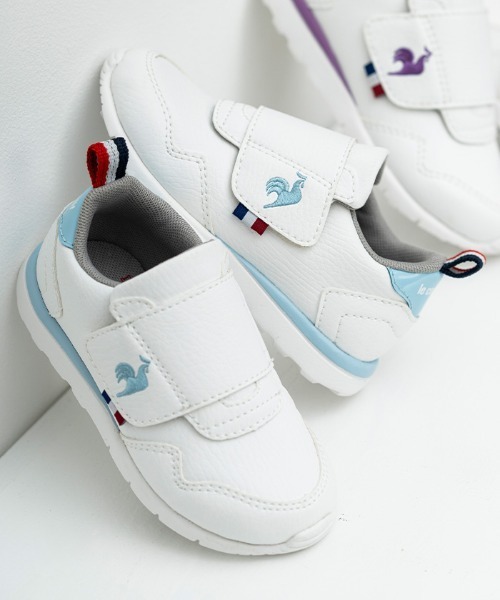 le coq sportif(ルコックスポルティフ)の「ラ セギュール F / LA SEGUR F(スニーカー・キッズ・ホワイト×ブルー/ホワイト×パープル・16.5cm/17.5cm/14.5cm/15.5cm/13.5cm/15.0cm/16.0cm/17.0cm/18.0cm/14.0cm/13.0cm)」の1枚目の写真