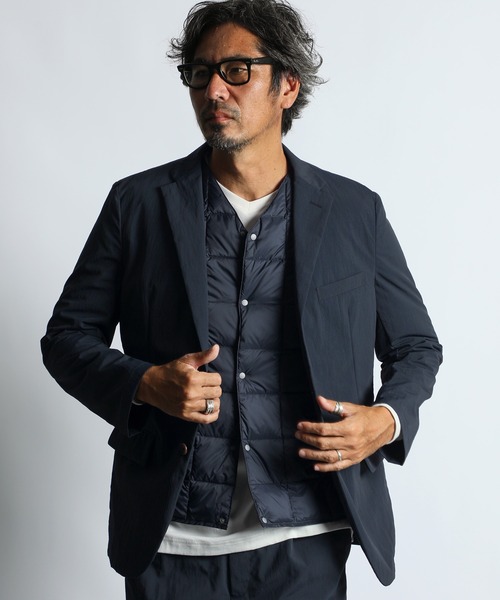TAION(タイオン)の「TAION×DUFFER V-NECK DOWN VEST:TAION別注 ベーシック Vネック インナーダウンベスト(ダウンベスト・メンズ・アイボリー/チャコールグレー/ブラック/ネイビー・LARGE/MEDIUM/X-LARGE)」の16枚目の写真