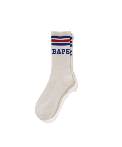 A BATHING APE(アベイシングエイプ)の「BAPE STRIPE SOCKS(ソックス/靴下・メンズ・ブラック×レッド/イエロー×グリーン/ブルー系その他4・MEDIUM/LARGE)」の1枚目の写真