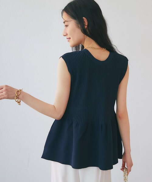La boutique BonBon（ラブティックボンボン）の「【1枚で決まるトレンドペプラム】ペプラムラメノースリニット（ニット/セーター・レディース・ネイビー/サックスブルー/ピンク・FREE）」の5枚目の写真
