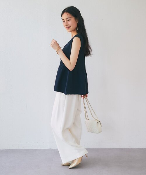 La boutique BonBon（ラブティックボンボン）の「【1枚で決まるトレンドペプラム】ペプラムラメノースリニット（ニット/セーター・レディース・ネイビー/サックスブルー/ピンク・FREE）」の7枚目の写真
