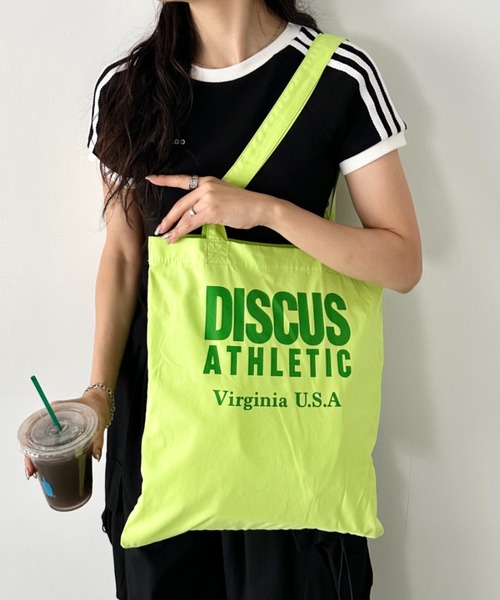 DISCUS(ディスカス)の「DISCUS/ディスカス ロゴプリント ハンドルトート/ブランドロゴ/A4/ライトコットン(トートバッグ・レディース・ライトグリーン/ホワイト/ピンク/ダークベージュ/イエロー/ブルー/ライトピンク/ライトブルー・FREE)」の1枚目の写真