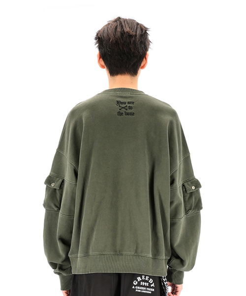 OURPOCKETS（アワーポケッツ）の「[NONE GRAPHIC]グリッドガーメントダイングオーバーサイズスウェットマンツーマン（シャドウカーキ）（スウェット・メンズ・カーキ・MEDIUM/X-LARGE）」の2枚目の写真
