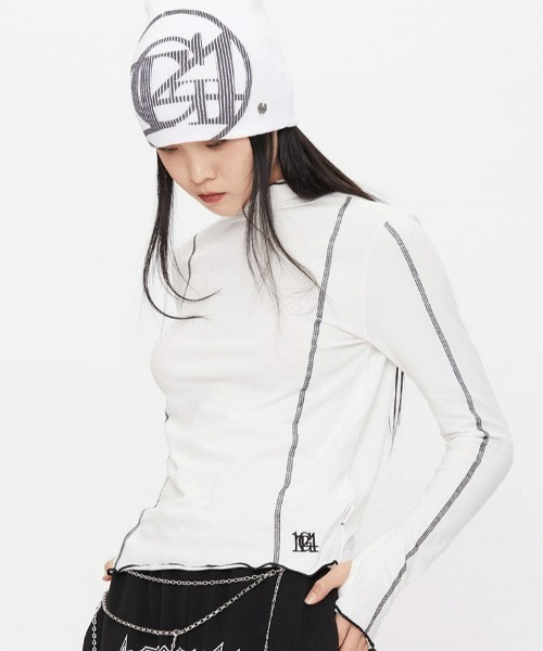 TARGETTO(ターゲット)の「A'GEM/9 × .kom『TARGETTO/ターゲット』LINING WARMER TURTLENECK/ウォーマータートルネック(Tシャツ/カットソー・レディース・ブラック/ホワイト・FREE)」の1枚目の写真