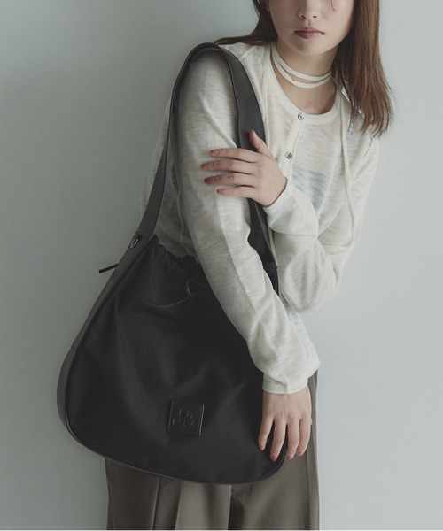 RT;ESKA(アールティーエスカ)の「RT;ESKA(アールティーエスカ) / Shape Tote - Circle(トートバッグ・レディース・ブラック/アイボリー・FREE)」の1枚目の写真